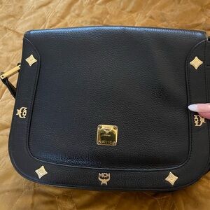 MCM Black Crossbody Bag with Gold Accents
